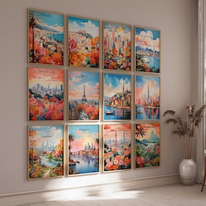 May include: A wall gallery of 12 framed paintings depicting cityscapes from around the world. Each painting features a different city, including Paris, London, Venice, Tokyo, Hong Kong, Dubai, Mexico City, Rio de Janeiro, and more. The paintings are all in a similar style, with bright colors and a whimsical feel.