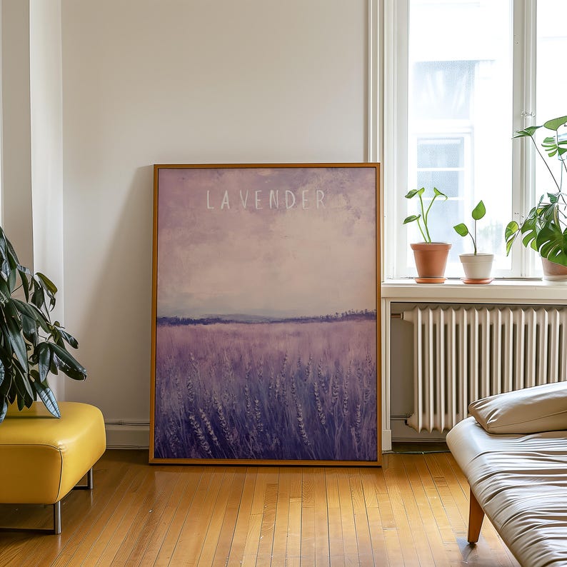 May include: A framed print of a lavender field with the word "LAVENDER" written in white text on a purple sky background.