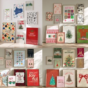 May include: A collection of framed Christmas-themed art prints displayed on a white wall. The prints feature festive designs like Christmas trees, ornaments, and holiday greetings in various styles and colors, creating a seasonal gallery.