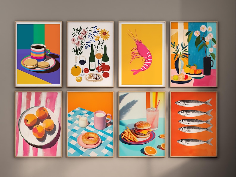May include: Set of eight colorful framed prints featuring various still life scenes, including a cup of coffee, a bouquet of flowers, a shrimp, a plate of fruit, a burger, a plate of peaches, a donut, and a plate of fish.