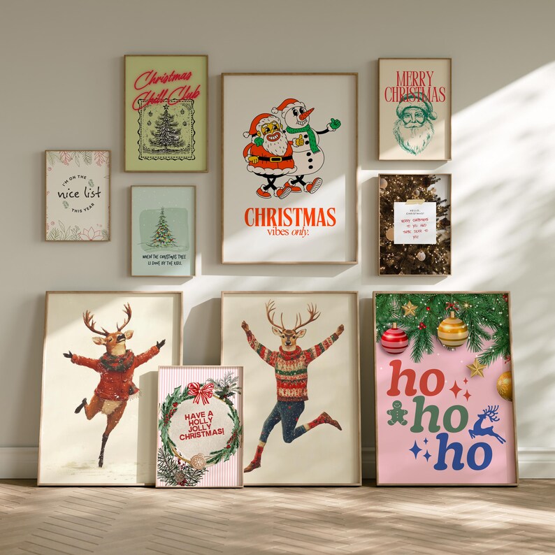 May include: A collection of framed Christmas-themed art prints. The prints feature festive illustrations, including Santa Claus, a snowman, reindeer, Christmas trees, and the text "Christmas vibes only" and "Merry Christmas".