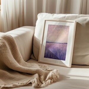 May include: A framed print of a watercolor painting depicting a field of lavender flowers. The painting is titled "Lavender Fields".