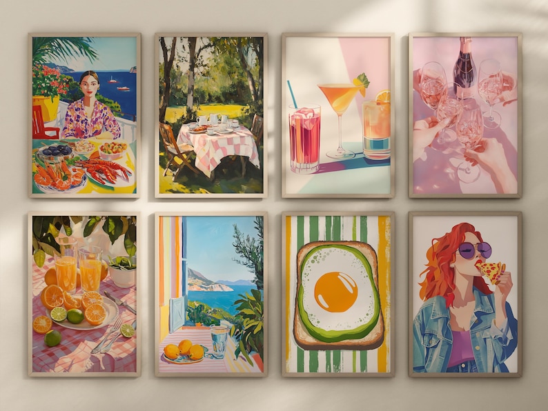May include: Set of eight framed prints featuring various colorful illustrations. The prints include a woman sitting at a table with food, a table setting in a garden, two cocktails, a glass of wine, a breakfast sandwich, a glass of orange juice, a view from a window, and a woman eating a slice of pizza.