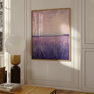 May include: A framed print of a lavender field with a soft, purple and pink color scheme. The text "LAVENDER" is written in white at the top of the image.