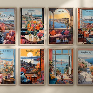 May include: Eight framed art prints featuring city views from open windows. Each print showcases a different city: Washington, Vienna, Venice, Toronto, Tel Aviv, Seattle, and Santorini. The artwork uses vibrant colors and depicts interior spaces with furniture and floral arrangements.