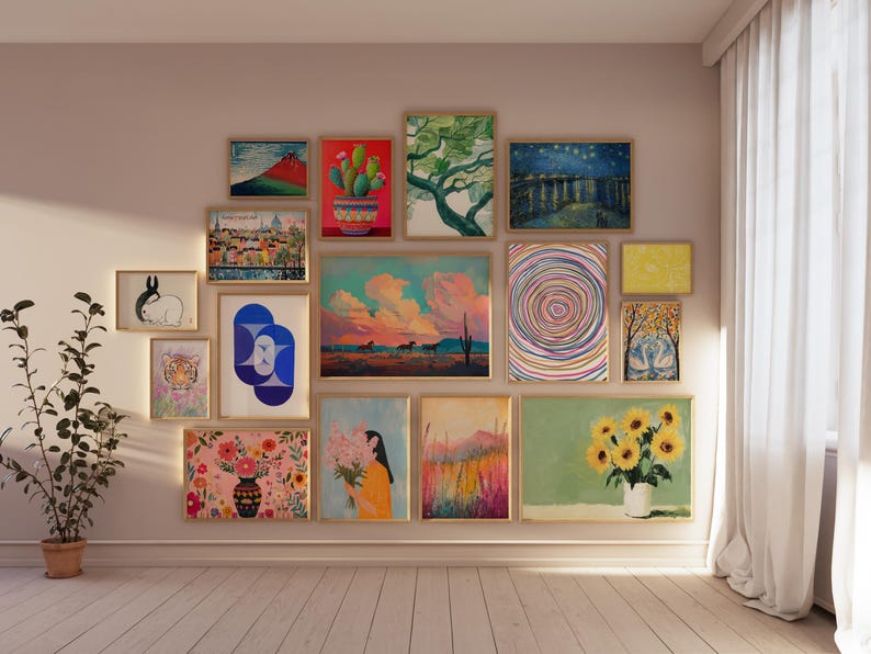 May include: A gallery wall with a variety of framed artwork, including abstract paintings, landscapes, and still lifes. The artwork is arranged in a grid pattern on a light pink wall.
