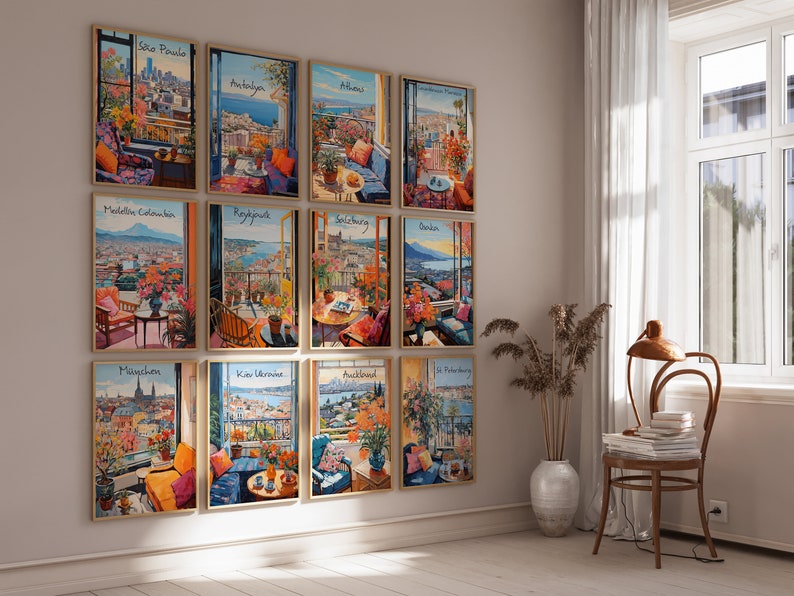 May include: A collection of framed art prints depicting scenic city views from balconies, including Sao Paulo, Antalya, and Athens. Each print features vibrant colors and floral arrangements, creating a warm and inviting atmosphere. The prints are displayed on a neutral wall.