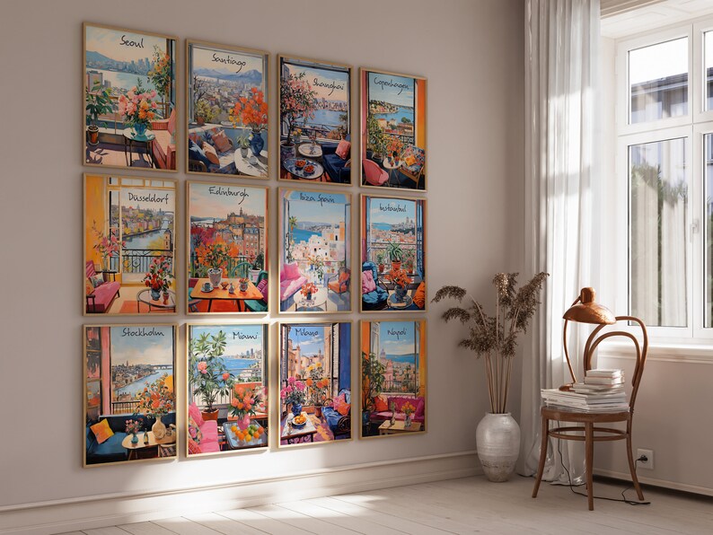 May include: A collection of framed art prints featuring watercolor illustrations of cityscapes. Each print showcases a different city, with vibrant colors and detailed depictions of balconies and floral arrangements. The prints are displayed on a neutral wall.