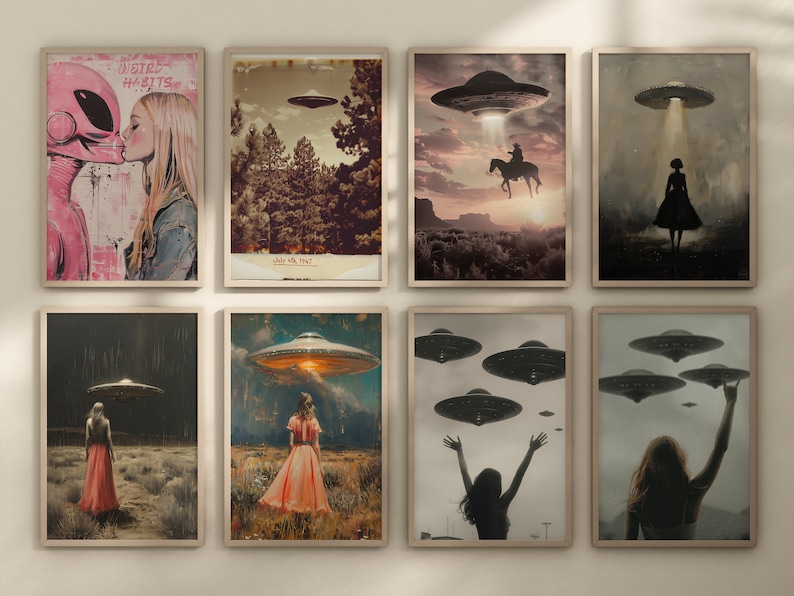 May include: A collection of eight framed art prints featuring retro-style illustrations of UFOs and figures. The artwork includes scenes of alien encounters, a cowboy on horseback, and figures in fields. One print features the text "WEIRD HABITS".