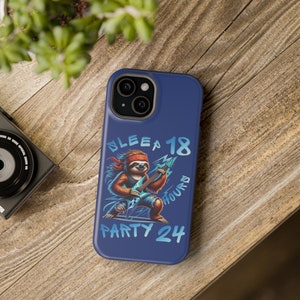 May include: A blue phone case with a sloth playing a guitar. The text on the case reads "Sleep 18 Hours Party 24".