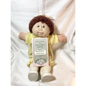 VTG Cabbage Patch Kid bruin haar grote wangen tong uitsteken met geboorteakte