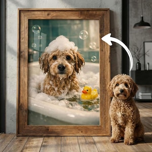 May include: A framed print of a dog in a bathtub with bubbles and a yellow rubber duck. The dog is brown with curly fur and has a soapy head. A second dog sits next to the framed print.