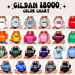 May include: A color chart for Gildan 18000 sweatshirts, showcasing a variety of colors. The chart displays sweatshirts in shades like white, ash, sport grey, sand, light pink, red, orange, gold, and more. The text "GILDAN 18000 COLOR CHART" is at the top.