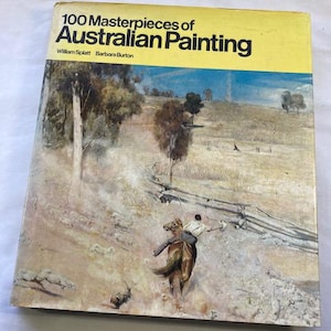 May include: A book titled "100 Masterpieces of Australian Painting" by William Splatt and Barbara Burton. The cover displays a landscape painting with a figure on horseback. The book has a yellow banner at the top.
