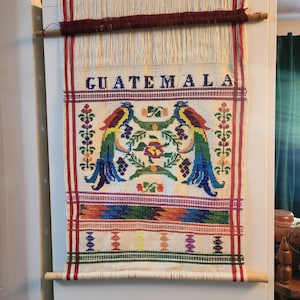 Vintage authentic Guatemalan Mayan handwoven textile quetzal bird wall art, white, black or green background and rainbow colorful design