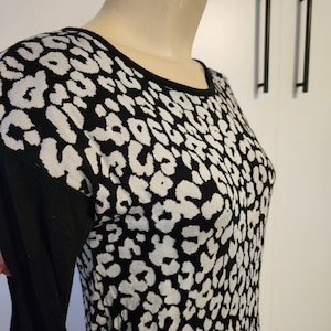S/M INC International Concepts cowl neckline long sleeve pullover top womens petite animal print black and silver cheetah print