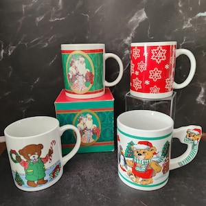 Vintage Christmas mugs, Santa, snowflakes, teddy bears, holiday themed handled coffee/tea/cocoa mugs