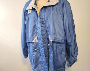 L vintage 90s shiny light blue with silver accents collared button up windbreaker jacket size large by Current Seen, hip wind breaker