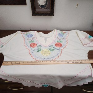 May include: A set of three ceramic mugs with a speckled, matte finish. The mugs are in shades of cream, light gray, and dark gray. Each mug has a simple, minimalist design and a rounded handle.