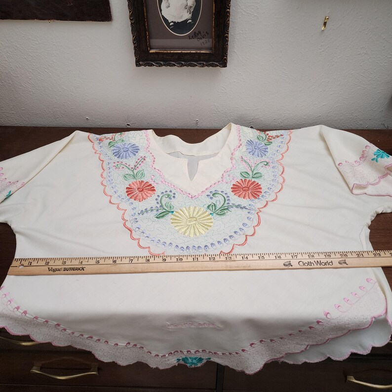 May include: A set of three ceramic mugs with a speckled, matte finish. The mugs are in shades of cream, light gray, and dark gray. Each mug has a simple, minimalist design and a rounded handle.