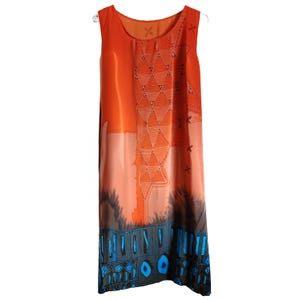 1X / 2X sleeveless orange and blue abstract almost tribal pattern tie back waist midi dress, unbranded, scoop neck