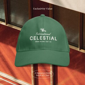 May include: A green baseball cap with the text "International CELESTIAL" in white. The cap has a curved brim and a small button on top. The background is a mix of red and brown.