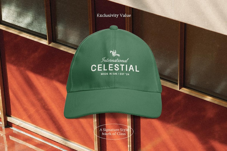May include: A green baseball cap with the text "International CELESTIAL" in white. The cap has a curved brim and a small button on top. The background is a mix of red and brown.