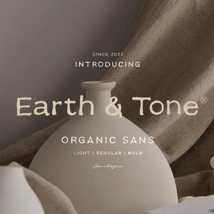 May include: A beige ceramic vase with a rounded body and a narrow neck is centered in the image. The text "Earth & Tone" is displayed in a soft, earthy font, with additional text reading "Organic Sans" and "Light | Regular | Bold."