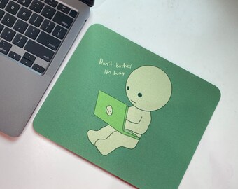 Green creature mousepad