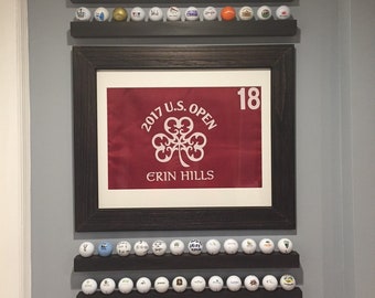 Floating golf ball display shelf