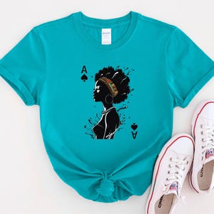 Pik-Ass schwarzes Damen-Shirt Afro-Frauen-T-Shirt Unisex mutiges Vermächtnis-Design für Kulturführer Redner und ermächtigte Stimmen