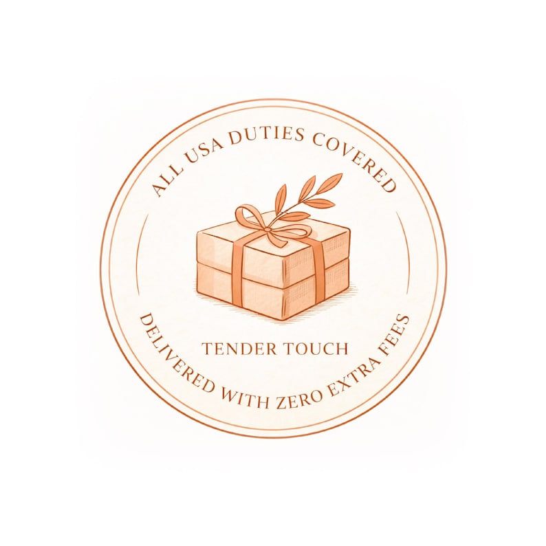 May include: A circular illustration with a gift box tied with a ribbon and a sprig of leaves. The text reads "ALL USA DUTIES COVERED" and "DELIVERED WITH ZERO EXTRA FEES". The words "TENDER TOUCH" are also included.