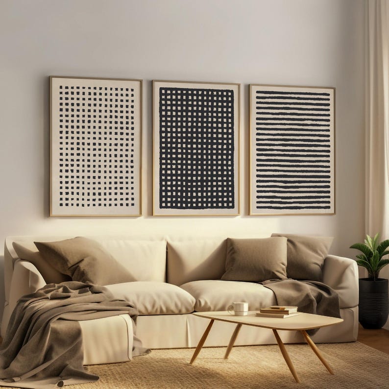 A set of three modern abstract digital prints featuring hand-drawn grid and line patterns in black ink on warm neutral background. The minimalist, organic textures add a subtle, sophisticated rhythm to any space, making them ideal for Scandinavian, Japandi, or contemporary interior styles.