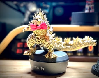 Exclusive Gold Godzilla Statue with Magnetic bow ties.