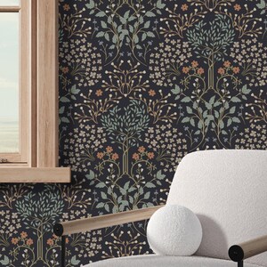 This image showcases the wallpaper pattern in an accent chair mockup. The wallpaper pattern features an intricate floral design inspired by William Morris.