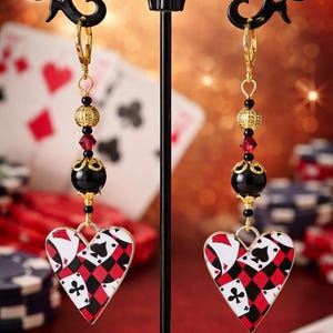 Orecchini a forma di cuore in oro con motivi AS