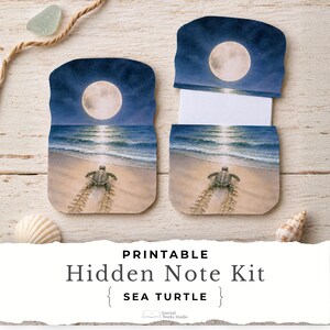 May include: A printable hidden note kit featuring a sea turtle illustration on a beach at night under a full moon. The kit includes two rectangular card components with rounded edges, one closed and one partially open to reveal a white interior.