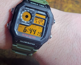 Mens Casio World Time AE-1200WH Custom Modified Orange Color Screen Mod with Green Strap Water Resistant Watch