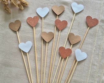 Hartvormige plectrums in een set voor bruiloften, gangpadversieringen, wereldlijke ceremonies, doop- of verjaardagsversieringen. Enkel- of dubbelzijdig dik papier