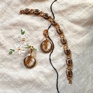 Vintage Damascene chain bracelet and dangle clip earrings.