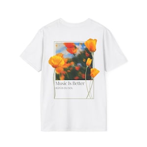 May include: White t-shirt with a graphic print of orange flowers and the text "Music Is Better" with the band name "R&Uuml;F&Uuml;S DU SOL" underneath.