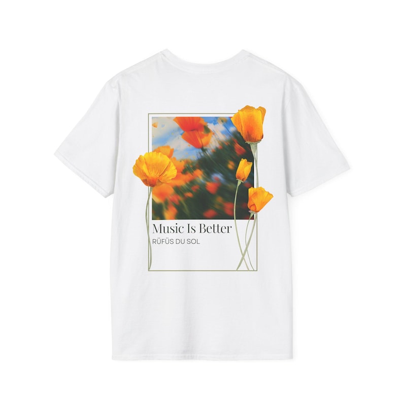May include: White t-shirt with a graphic print of orange flowers and the text "Music Is Better" with the band name "R&Uuml;F&Uuml;S DU SOL" underneath.