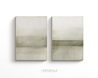 May include: Two abstract paintings in muted green and white tones. The paintings are divided into horizontal bands of colour, creating a layered effect.