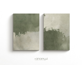 May include: Two abstract paintings with a green and white color scheme. The paintings are on canvas and have a textured surface.