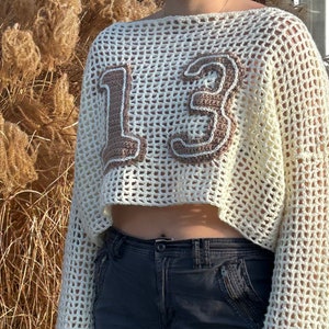 Gehäkelter Pullover im Mesh-Jersey-Stil