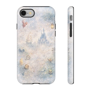 Puede incluir: Una funda de teléfono con un diseño de acuarela caprichoso. La funda muestra un castillo, un barco, globos y otros elementos de fantasía en suaves colores pastel. La funda tiene un borde negro y un acabado brillante.