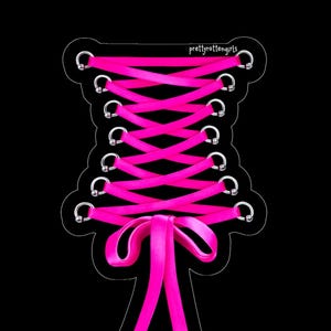 May include: A graphic of a pink corset with a ribbon bow and lacing, set against a black background. The corset design features silver eyelets and the text "prettyrottengirls" in the upper right corner.