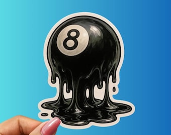 May include: A black and white sticker featuring an 8-ball with a melting, liquid design. The number 8 is visible on the white circle. The sticker has a glossy finish and is held against a blue background.