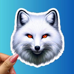 Majestic Arctic Fox Sticker with Fiery Eyes, Mystical Animal Decal, Winter Wildlife Art, Bold Fox Sticker for Laptops and Water Bottles