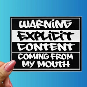 May include: A set of three ceramic mugs with a speckled, matte finish. The mugs are in shades of cream, light gray, and dark gray. Each mug has a simple, minimalist design and a rounded handle. The mugs are likely for coffee or tea.